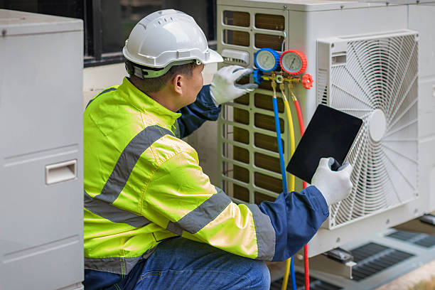 Professional Air Duct Cleaning technician working in Hampton, VA